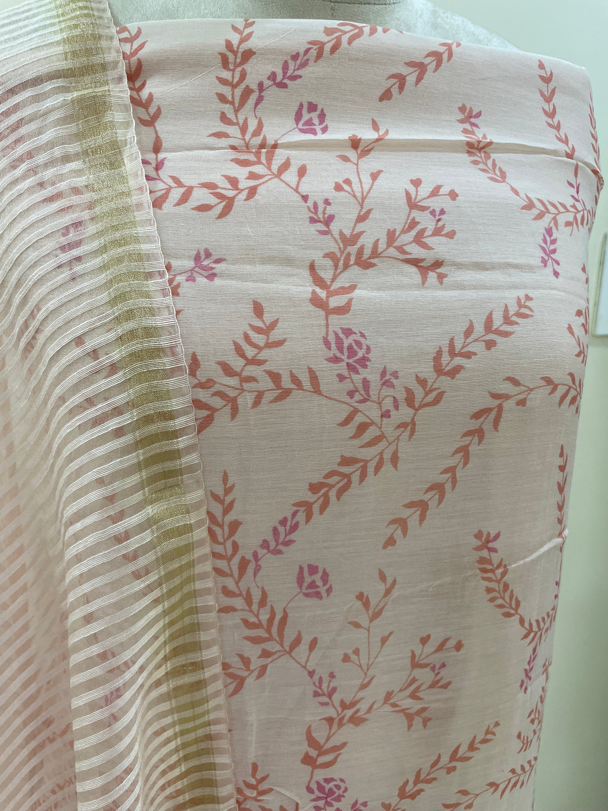 Mallepuvvu – Peach Pink Printed Mulmul Unstitched Suit Set