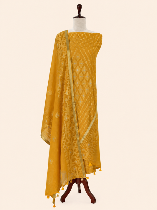 Mallepuvvu Mustard Yellow mulmul unstitched suit set by Aura